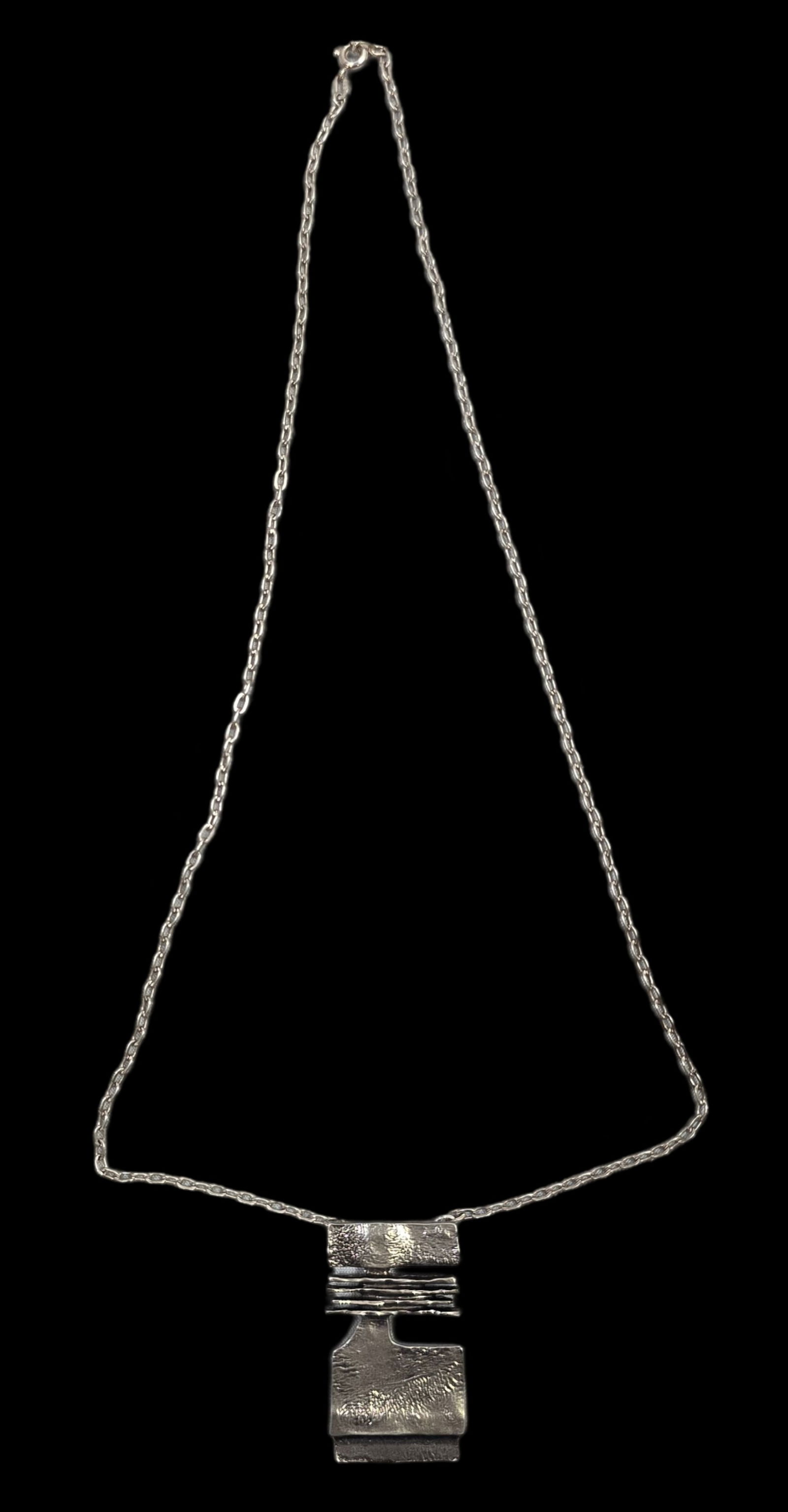 Vintage Mid-Century Modern Brutalist European 835 Silver Pendant Necklace: Beautiful and very stylish piece; Central Europe, ca. 1960. Very good vintage condition with minor patina according to age. Measures approx. 20" long (chain) and weighs ca. 18.6 grams (total weight).