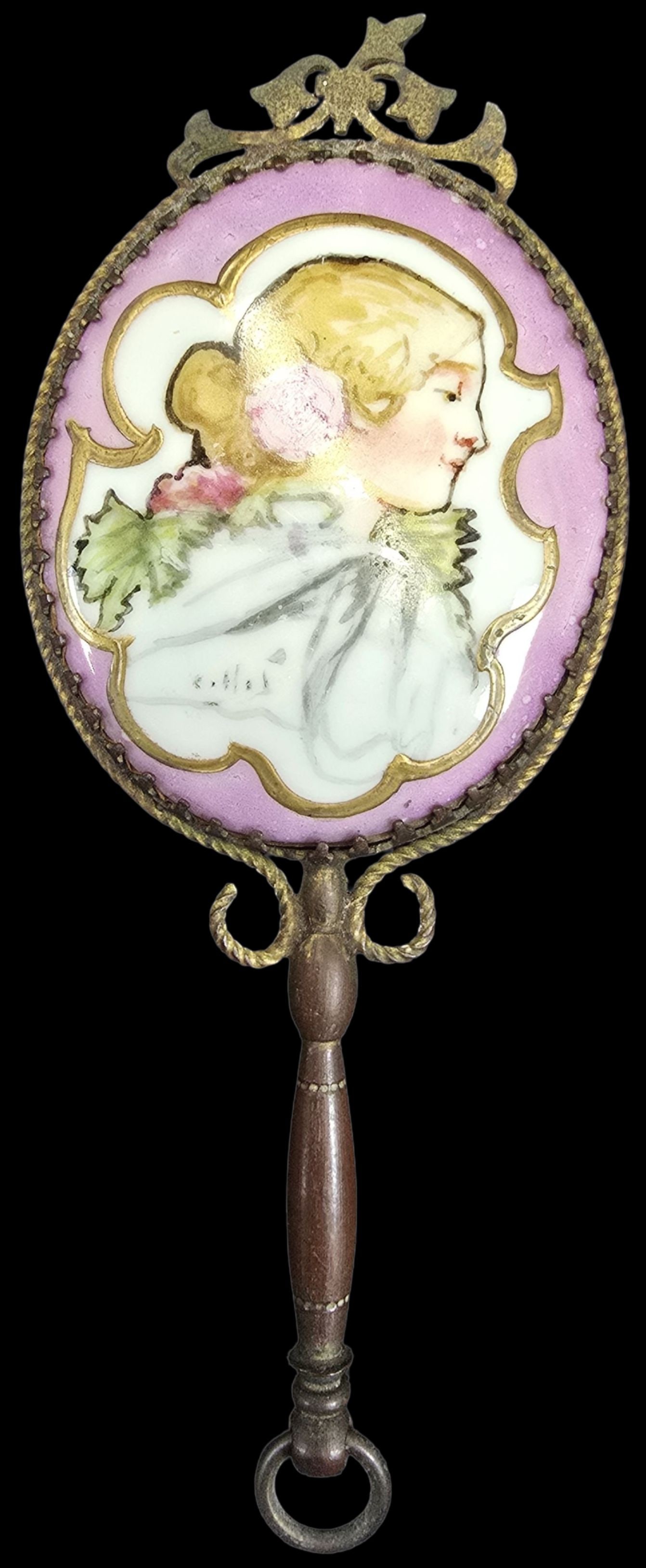 Antique 19th Cent. French Bronze Ormolu Hand Mirror /w Porcelain Portrait Plaque: An antique 19th Century French bronze hand mirror with a hand-painted porcelain portrait of a woman. Very good antique condition with wear and patina according to age. Measures approx. 4" high x 2" wi
