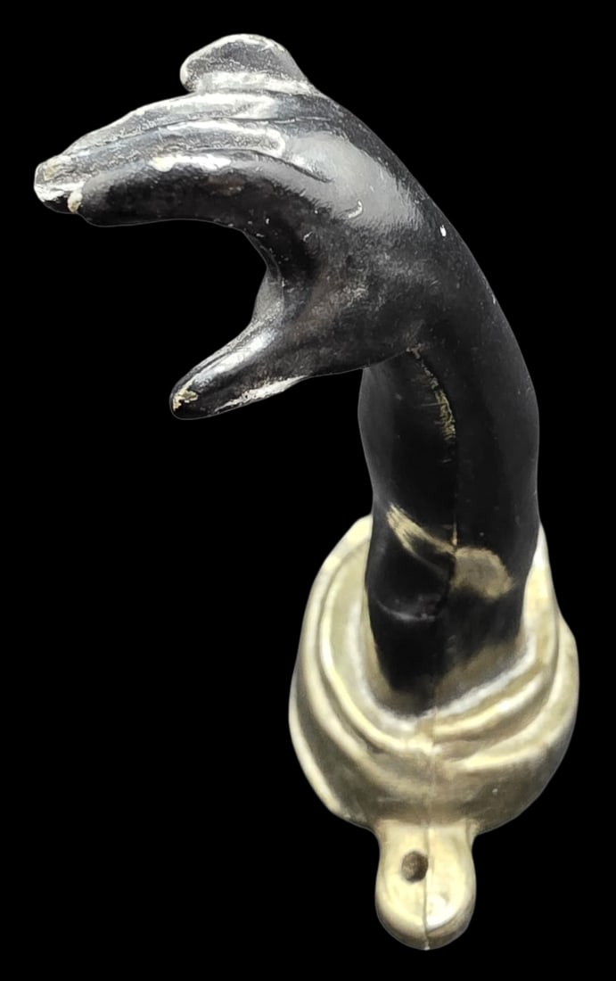 Very Unusual Vintage PETITES CHOSES Painted Cast Metal Arm Shaped Wall Hanger: A vintage Petites Choses Blackamoor arm wall hook, made of cast metal with black paint and a brass/gold finish base. Measures approx. 4" long. Very good vintage condition with minor wear and paint los
