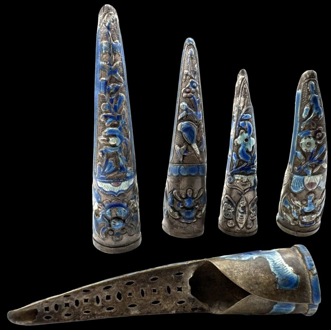 Antique 5 Pairs of Chinese Silver Enamel Fingernail Cuffs: Very good antique condition with some wear and patina according to age. The largest piece measures approx. 2 2/8" long x 1/2" wide and they jointly weigh ca. 32 grams.