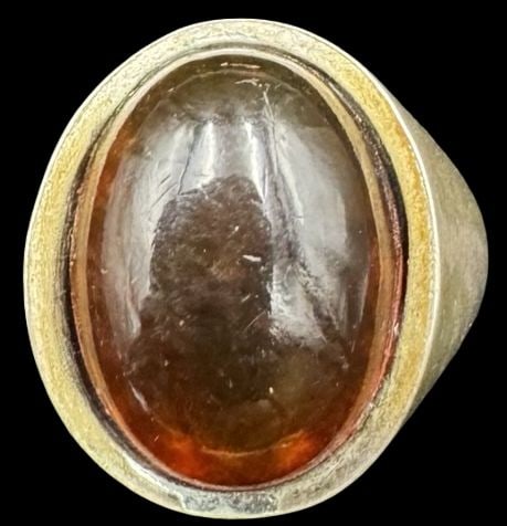 Stylish Vintage Sterling Silver & Amber Designer Ring: Very good vintage condition with minor patina according to age. Measures approx. 3/4" long x 1/2" wide and weighs ca. 6.2 grams. The ring is a size 6 1/2. Marked for Sterling Silver & Designer.