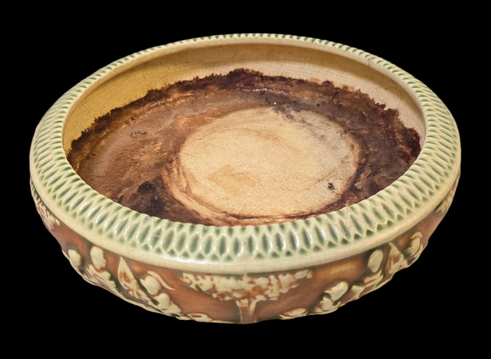 Vintage ROSEVILLE Art Pottery DONATELLO Green & Brown Ceramic Bowl: Very good vintage condition with minor wear according to age, please see pictures. No cracks or repairs. Measures approx. 2 1/2" high x 12" wide. Marked.