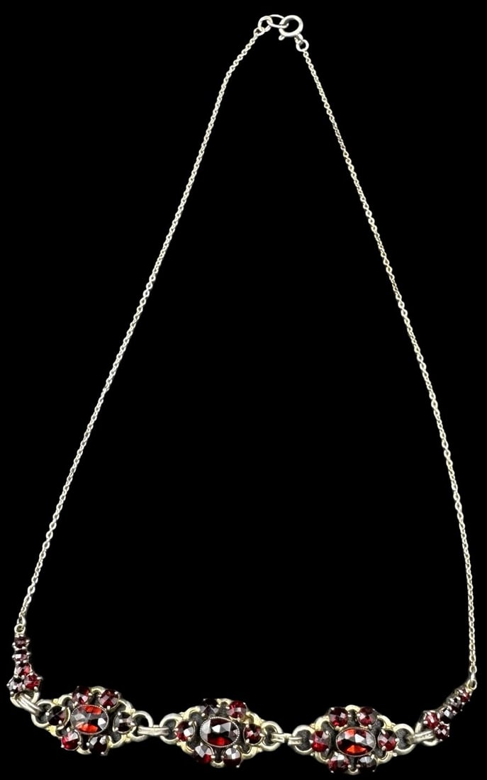 Gorgeous Vintage European 835 Silver & Red Garnet Necklace: Very good vintage condition with minor patina according to age. Piece with stones measures approx. 4" long x 1/2" wide and total weight is ca. 8.6 grams. Necklace is ca. 18" long. Marked for 835 Silve
