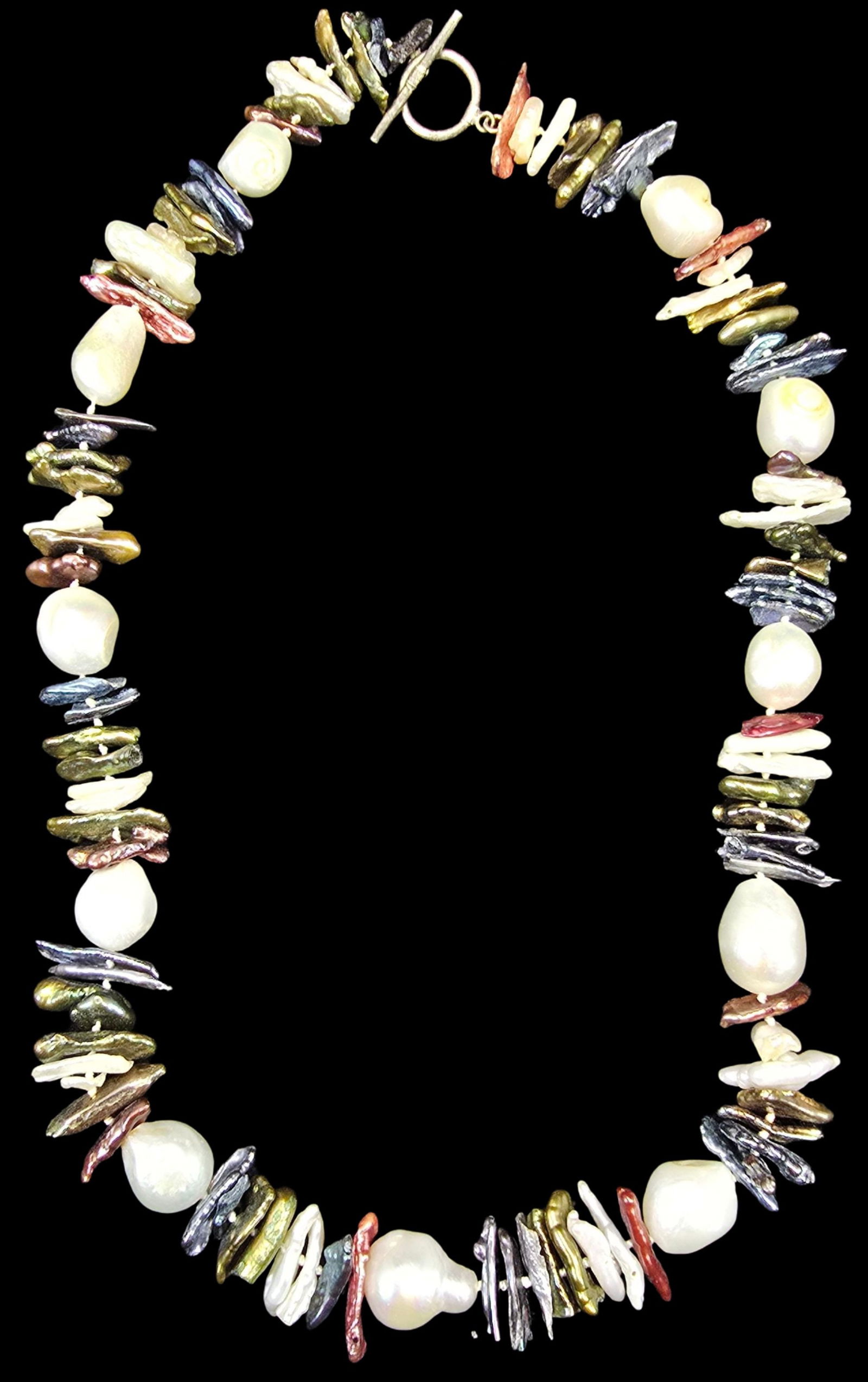 Beautiful Vintage Multicolor Pearl Necklace /w Sterling Silver Toggle Clasp: Very good vintage condition with minor patina according to age. Measures approx. 18" long and weighs ca. 59 grams.