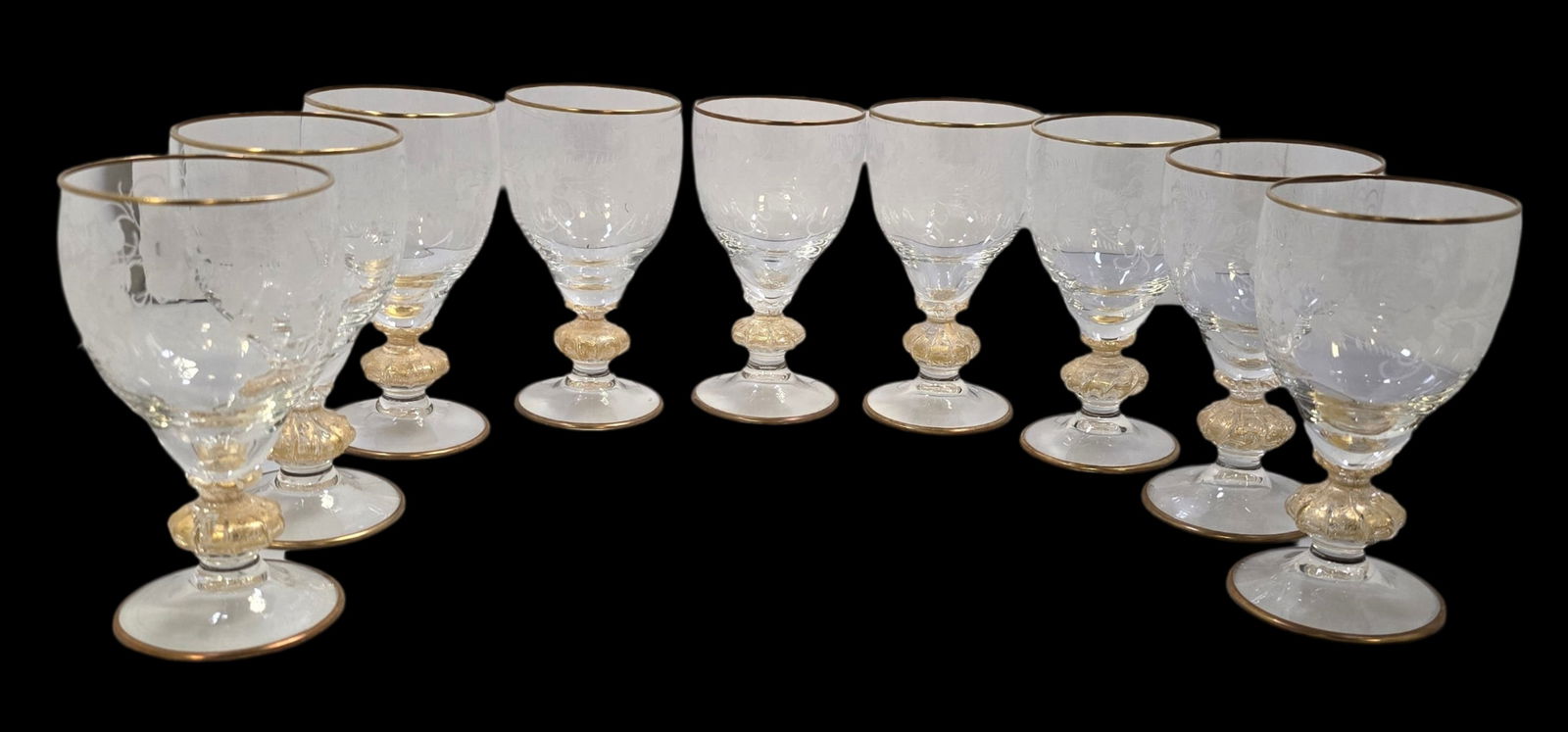 Set of 9 Antique Hand Cut Crystal & Gold Flake Glasses: Very good vintage condition; no chips, cracks, or repairs. Each measures approx. 5" high x 3" in diameter.