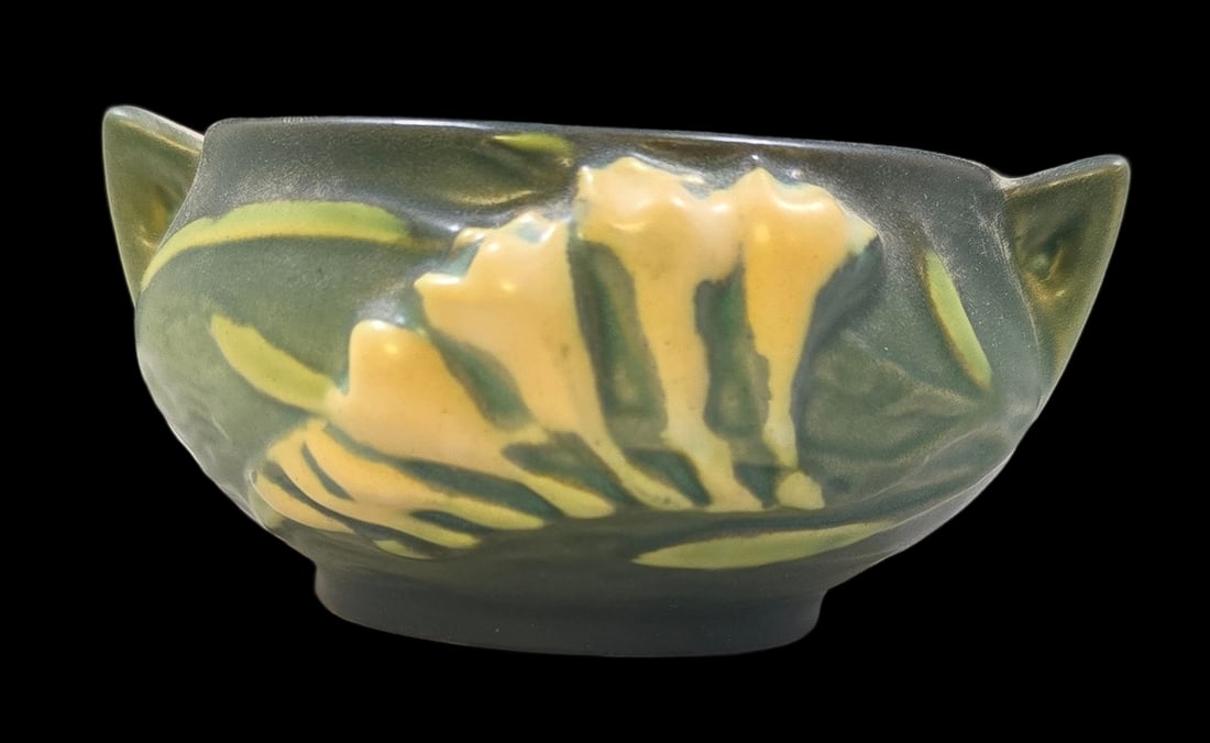 Vintage ROSEVILLE Art Pottery FREESIA Green Ceramic Bowl: Very good vintage condition with minor wear according to age, please see pictures. No cracks or repairs. Measures approx. 2 1/2" high x 5" wide. Marked.