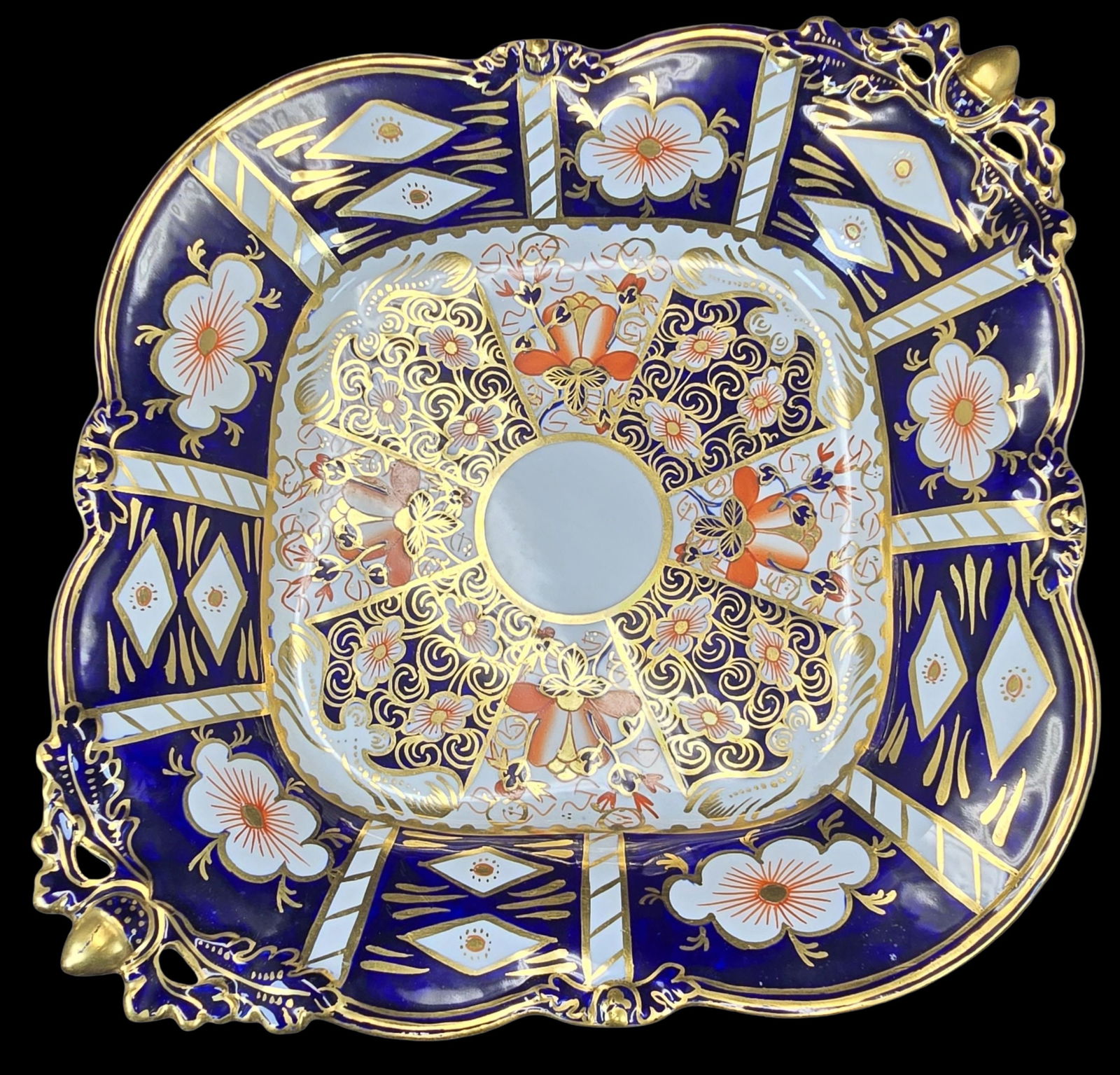 Beautiful Vintage ROYAL CROWN DERBY Porcelain Imari Pattern Footed Serving Dish: Very good vintage condition. no chips, cracks or repairs. Measures approx. 2" high x 9" wide. Marked on the bottom.