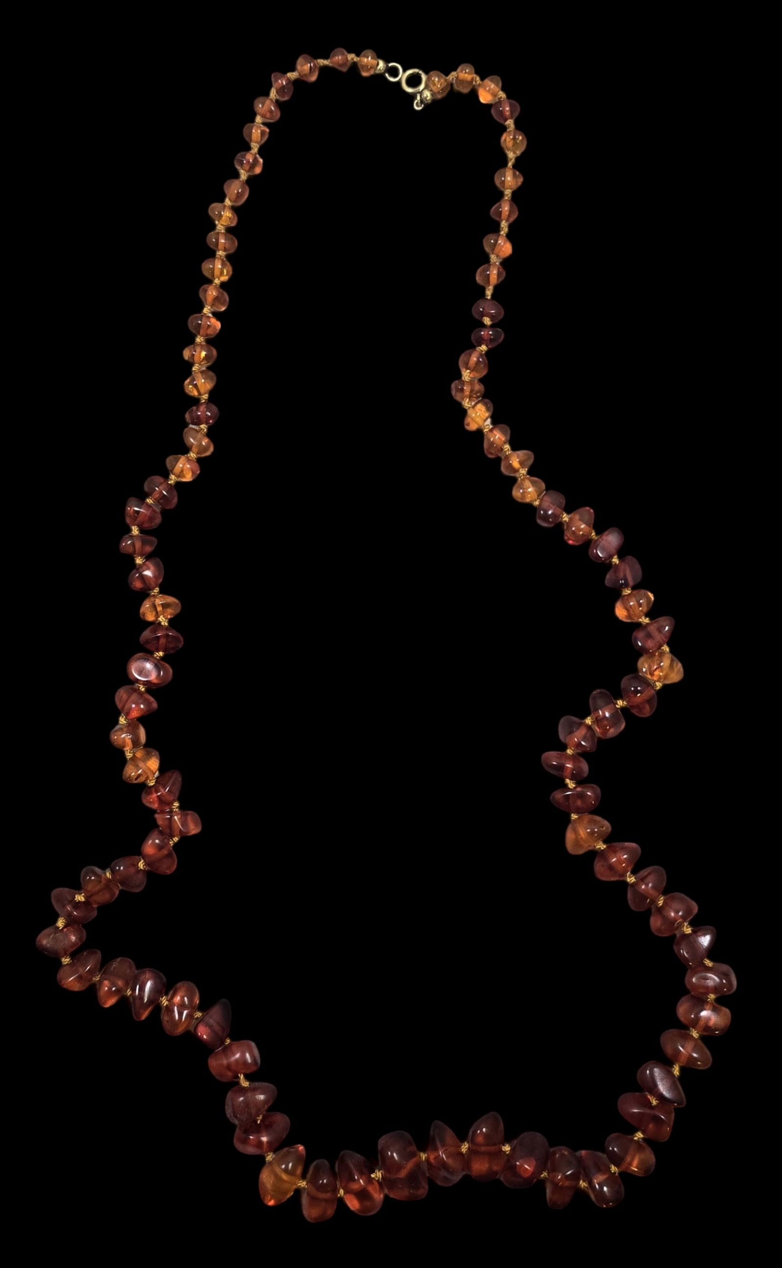 Vintage European Baltic Amber Bead Necklace: Very good vintage condition with some patina according to age, please see pictures. Measures approx. 15" long.