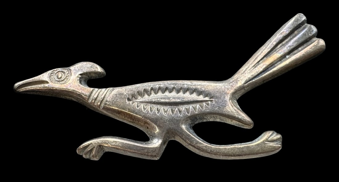 Vintage Native American Sterling Silver Road Runner Brooch: Very good vintage condition with minor patina according to age. Measures approx. 2 1/8" long x 7/8" wide. Tested For Sterling Silver.