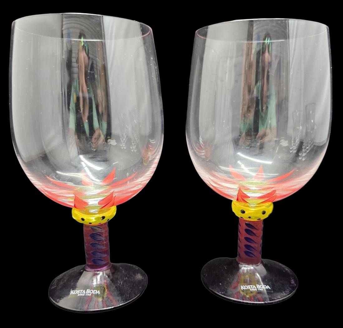 Rare Pair of Vintage KEN DONE for KOSTA BODA Water Goblets: Highly collectible and no longer in production, the Palm Trees stemware collection by Kosta Boda was designed by Ken Done, a well-known Australian artist. This set of 2 water goblets features a hand-p
