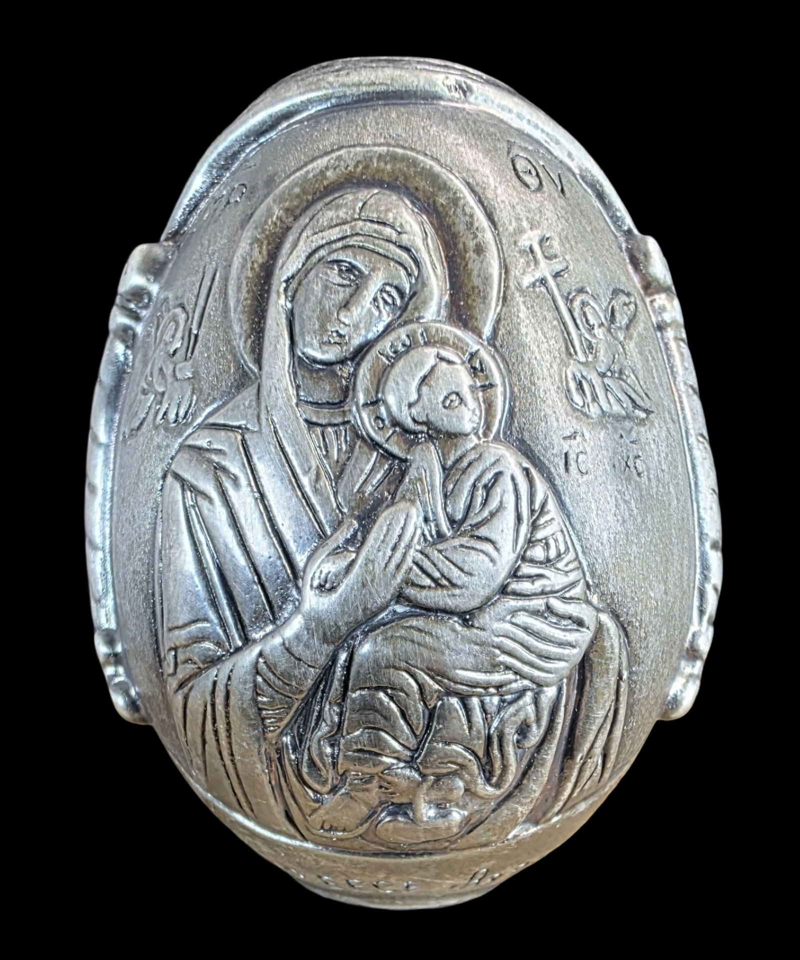 Unusual Vintage Christian Religious Greek Orthodox Sterling Silver Egg: Very good vintage condition with minor patina according to age. Marked on base "Ag999,7 Made in Greece, Patented 72". Measures approx. 2 1/2" high x 2" wide and weighs ca. 122 grams.
