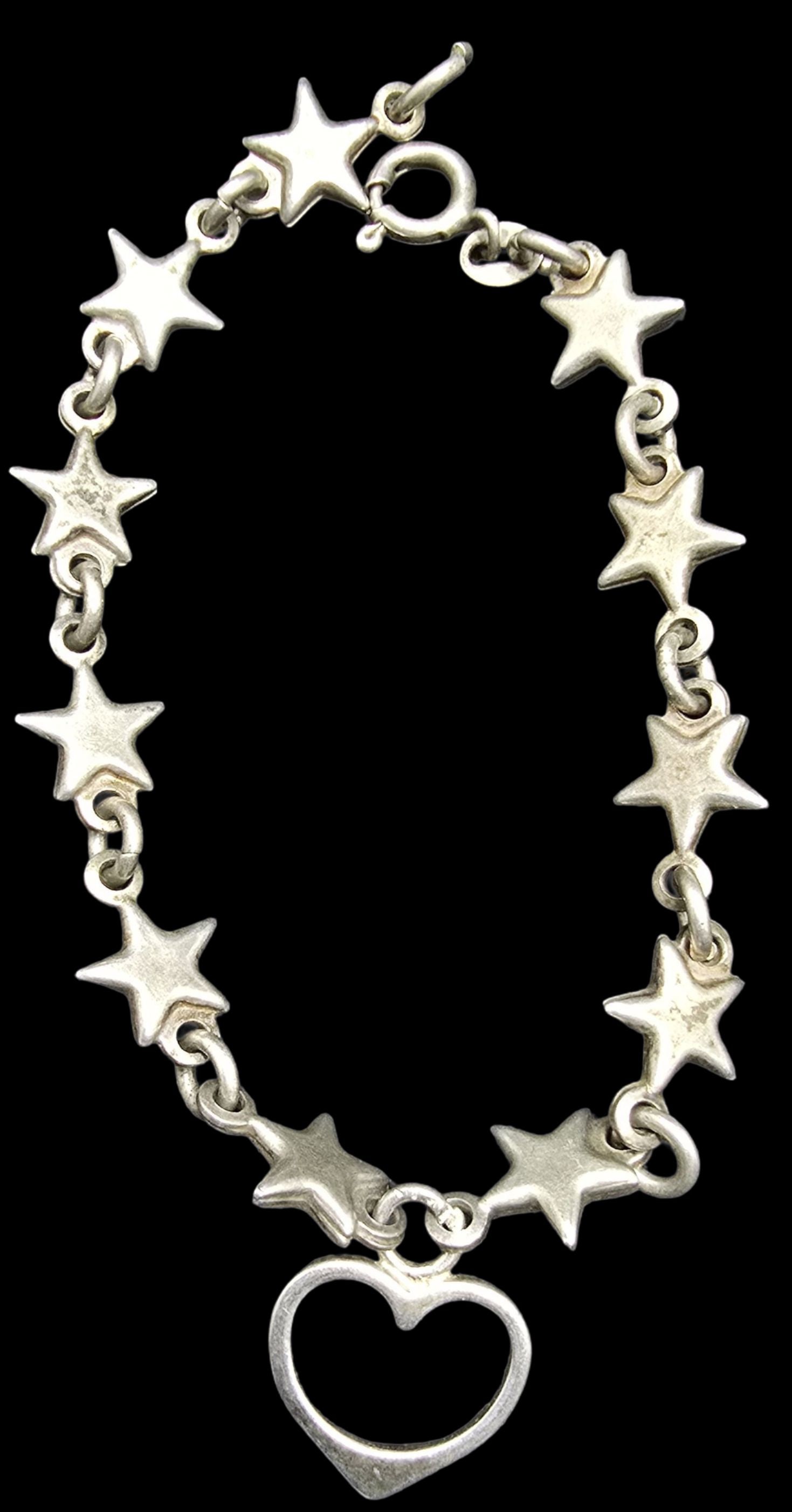 Gorgeous Ornate Vintage Sterling Silver Bracelet /w Star & Heart Charms: Very good vintage condition with minor patina according to age. Measures approx. 8" long and weighs ca. 9 grams. Marked for Sterling Silver.