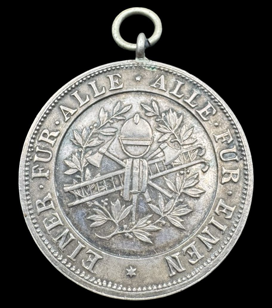 Vintage German 800 Silver Firefighter Medal Pendant: Very good vintage condition with minor patina according to age. Measures approx. 1/8" in diameter & weighs ca. 11 grams. Tested for a minimum of 800 (80%) silver.