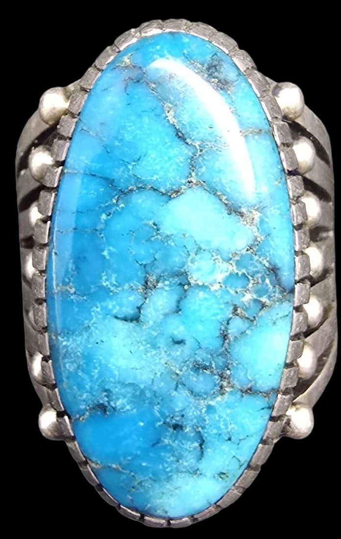 Rare Vintage Native American Navajo HOWARD NELSON Sterling Silver & Spider Web Turquoise Ring: Very good vintage condition with minor patina according to age. Measures approx. 1" long and ??" wide and weighs ca. 10 grams. The ring is a size 7. Marked for Sterling Silver & Designer