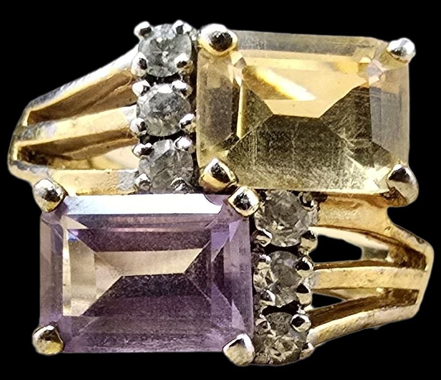 Gorgeous Vintage Gilt Sterling Silver Ring /w Clear, Purple & Yellow Gemstone: Very good vintage condition with minor patina according to age. The ring is a size 6 and weighs ca. 4 grams. Marked for Sterling Silver & Designer.