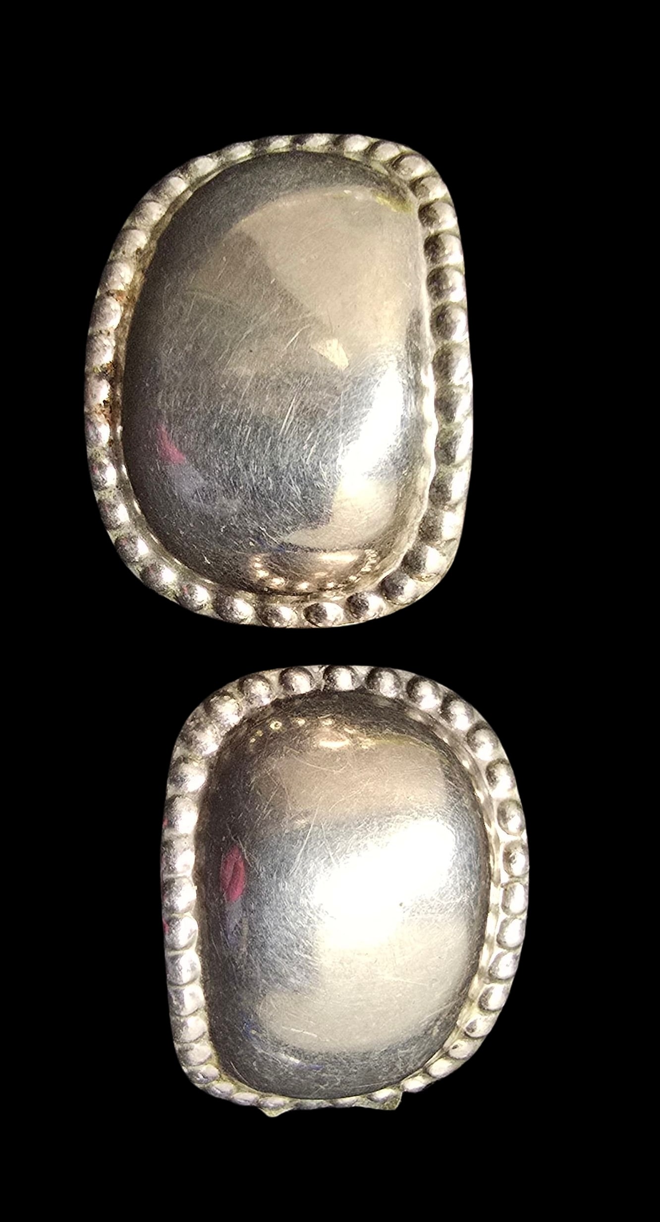 Stylish Pair of Vintage Sterling Silver Clip-On Earrings: Very good vintage condition with minor patina according to age. Each measures approx. 1" long and they jointly weigh ca. 11 grams. Marked for Sterling Silver.