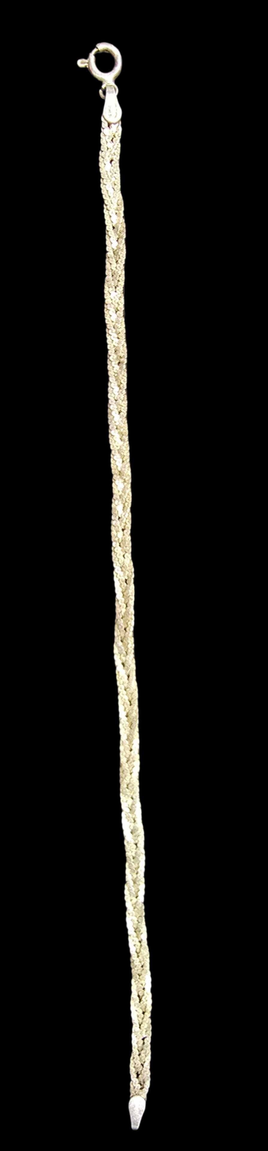 Beautiful Vintage Sterling Silver Braided Chain Bracelet: Very good vintage condition with minor patina according to age. Measures approx. 6" long and weighs ca. 3.5 grams. Marked for Sterling Silver.