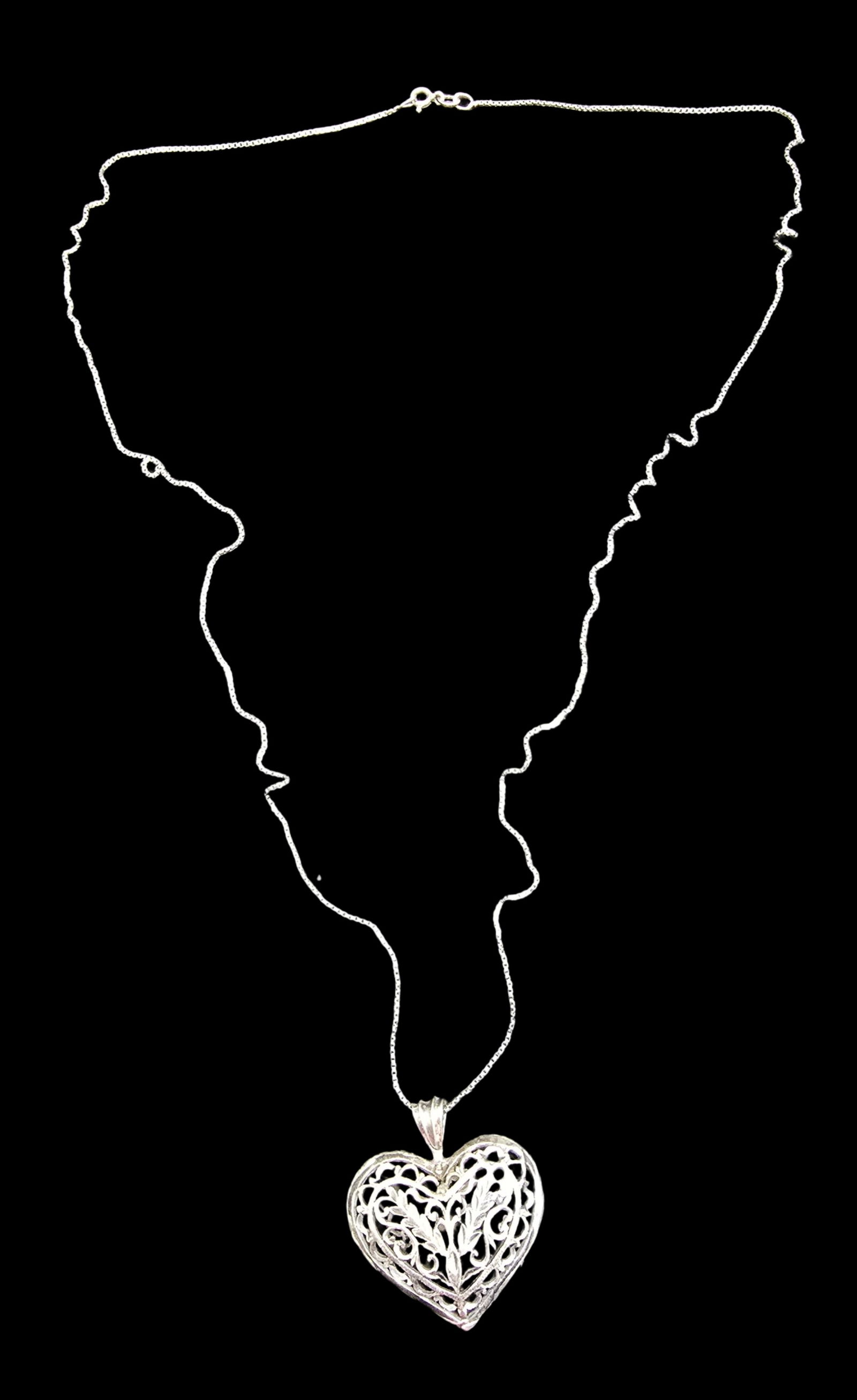 Beautiful Vintage Sterling Silver Necklace /w Heart Shaped Pendant: Very good vintage condition with minor patina according to age. Measures approx. 30" long and weighs ca. 13 grams. Marked for Sterling Silver.