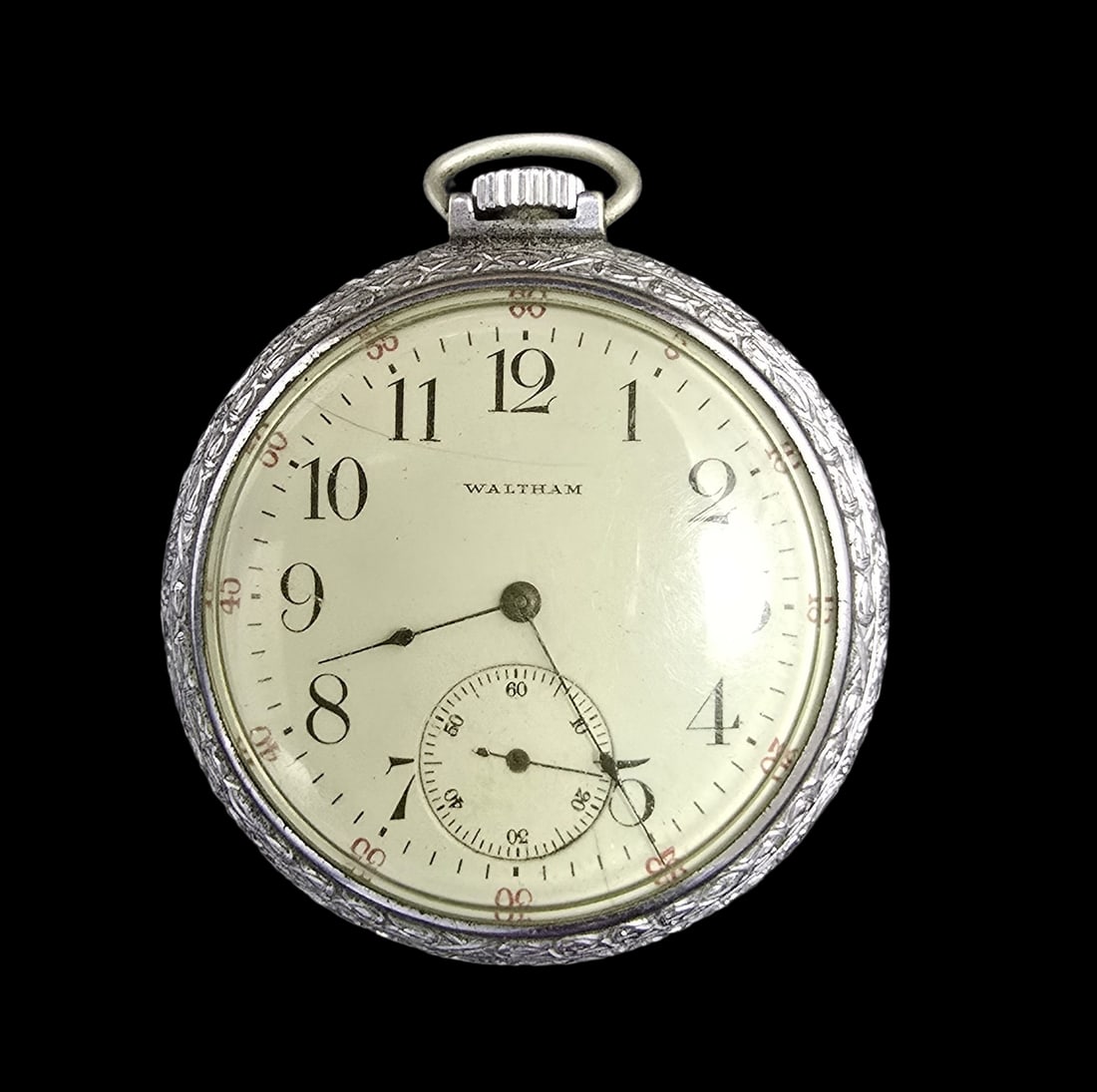 Gorgeous Ornate WALTHAM Vintage Silver Tone Pocket Watch: Very good vintage condition with minor patina according to age. Measures approx. 2" long x 2" wide and weighs ca. 58 grams.