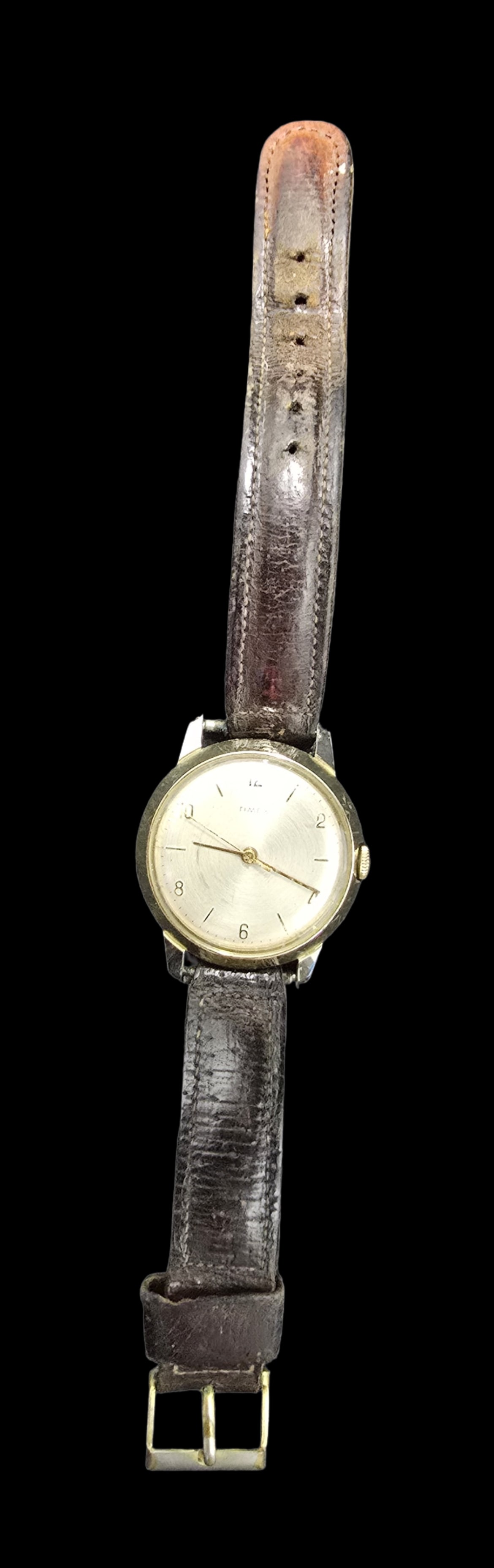 Vintage TIMEX Wristwatch: Very good vintage condition with minor patina according to age. Measures approx. 8 1/2" long (strap) and weighs ca. 19.5 grams. Marked TIMEX.