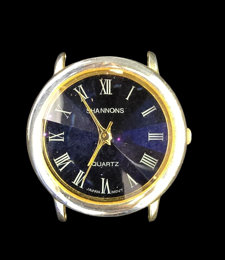 Gorgeous Vintage SHANNONS Quartz Watch: Very good vintage condition with minor patina according to age. Measures approx. 1 " in diameter and weighs ca. 18.5 grams. Marked SHANNONS. No Strap.