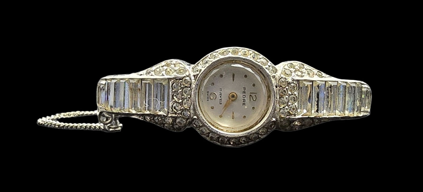 Gorgeous Vintage Swiss PEDRE Silver-Tone Ladies Watch: Very good vintage condition with minor patina according to age. Measures approx. 2 1/2 " wide (inside diameter) and weighs ca. 34.5 grams. Marked PEDRE.