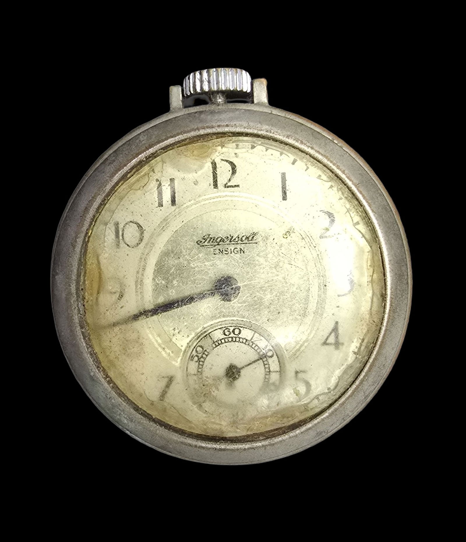 Great Vintage INGERSOLL ENSIGN Silver-Tone Pocket Watch: Very good vintage condition with minor patina according to age. Measures approx. 2" long x 2" wide and weighs ca. 60.5 grams.