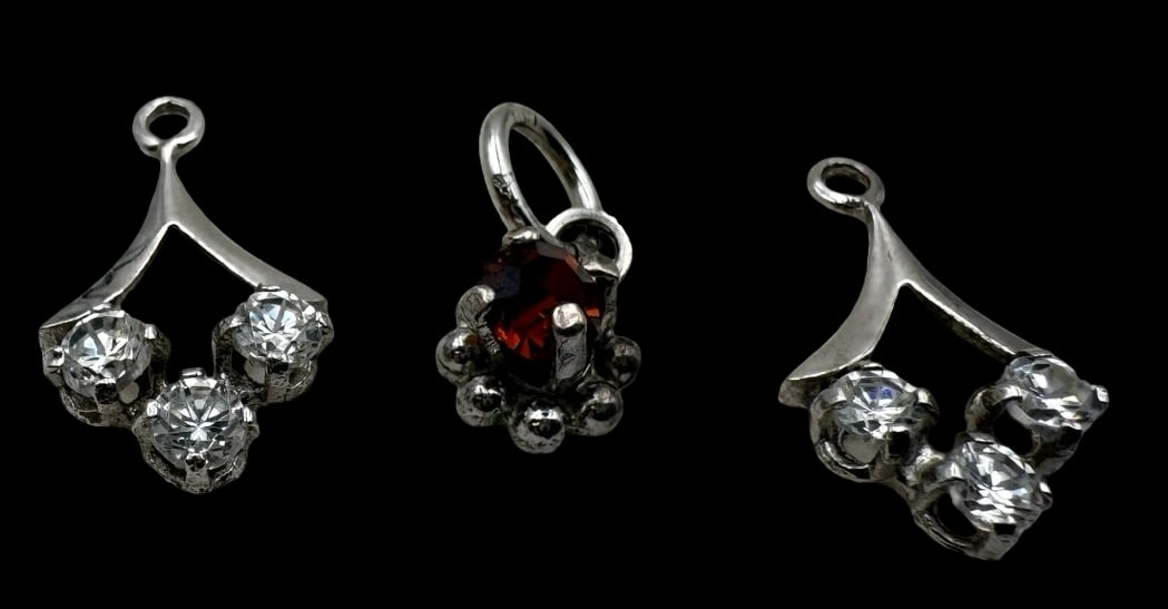 Set of 3 Vintage European 835 Silver & Gemstone Pendants: Very good vintage condition with minor patina according to age. The largest piece measures approx. 3/8" long x 1/4" wide and they jointly weigh ca. 1.4 grams. Marked / tested for 835 (83.5%) silver.