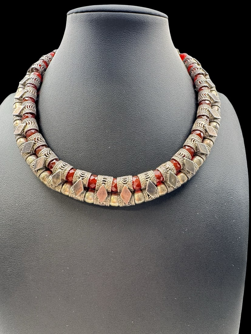 Ornate Antique Oriental Tribal 900 Silver & Carnelian Necklace: Very good antique condition with minor patina according to age. Measures approx. 3/4" wide & weighs ca. 152.2 grams. Inner circumference is approx. 15". Tested for a minimum of 900 Silver.