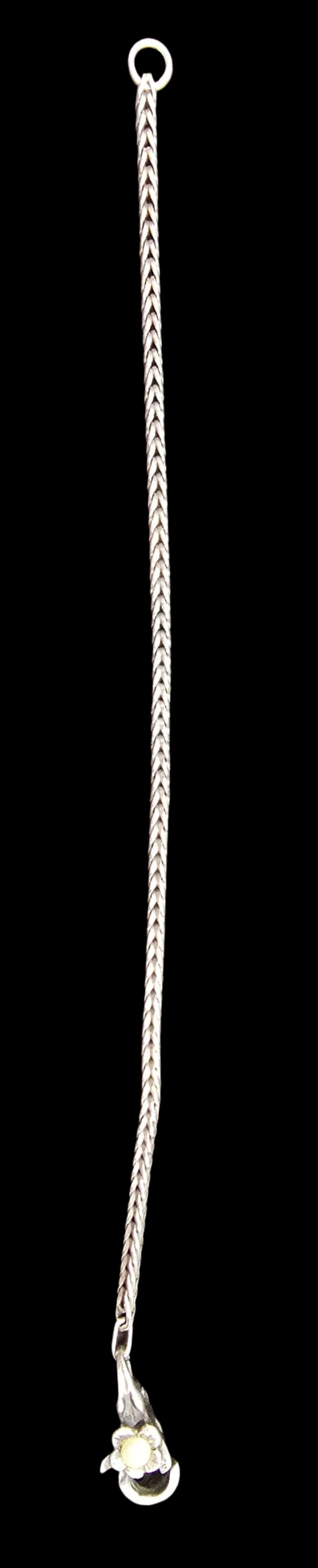 Very Unsual Vintage Sterling Silver & Pearl Snake Chain Bracelet /w Flower Shaped Clasp: Good vintage condition with minor patina according to age; missing one pearl. Measures approx. 8 " long and weighs ca. 11.5 grams. Marked for Sterling Silver.