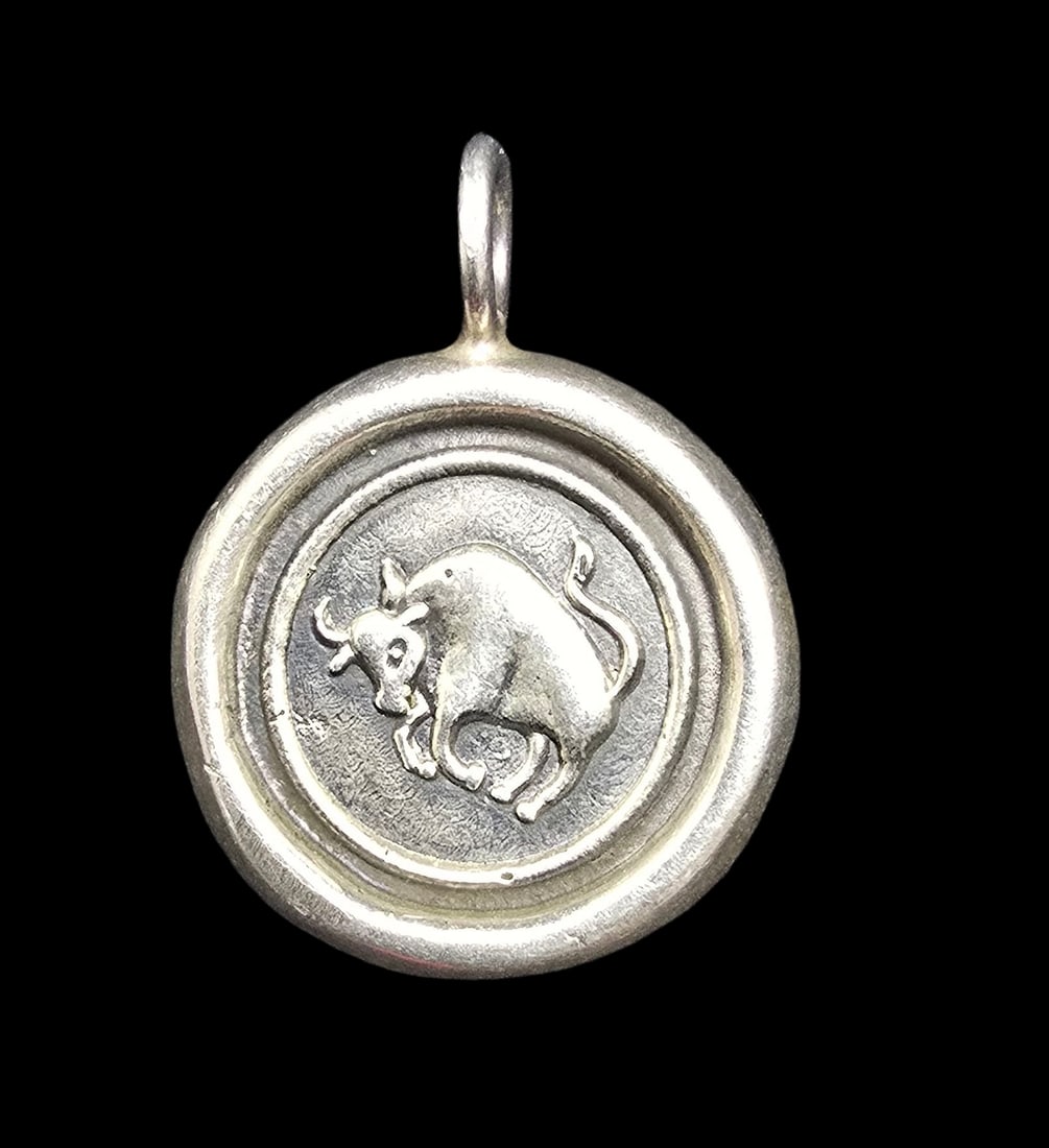 Amazing Vintage Sterling Silver Zodiac Taurus Pendant Charm: Very good vintage condition with minor patina according to age. Measures approx. 1" long x 1" wide and weighs ca. 6 grams. Marked for Sterling Silver.