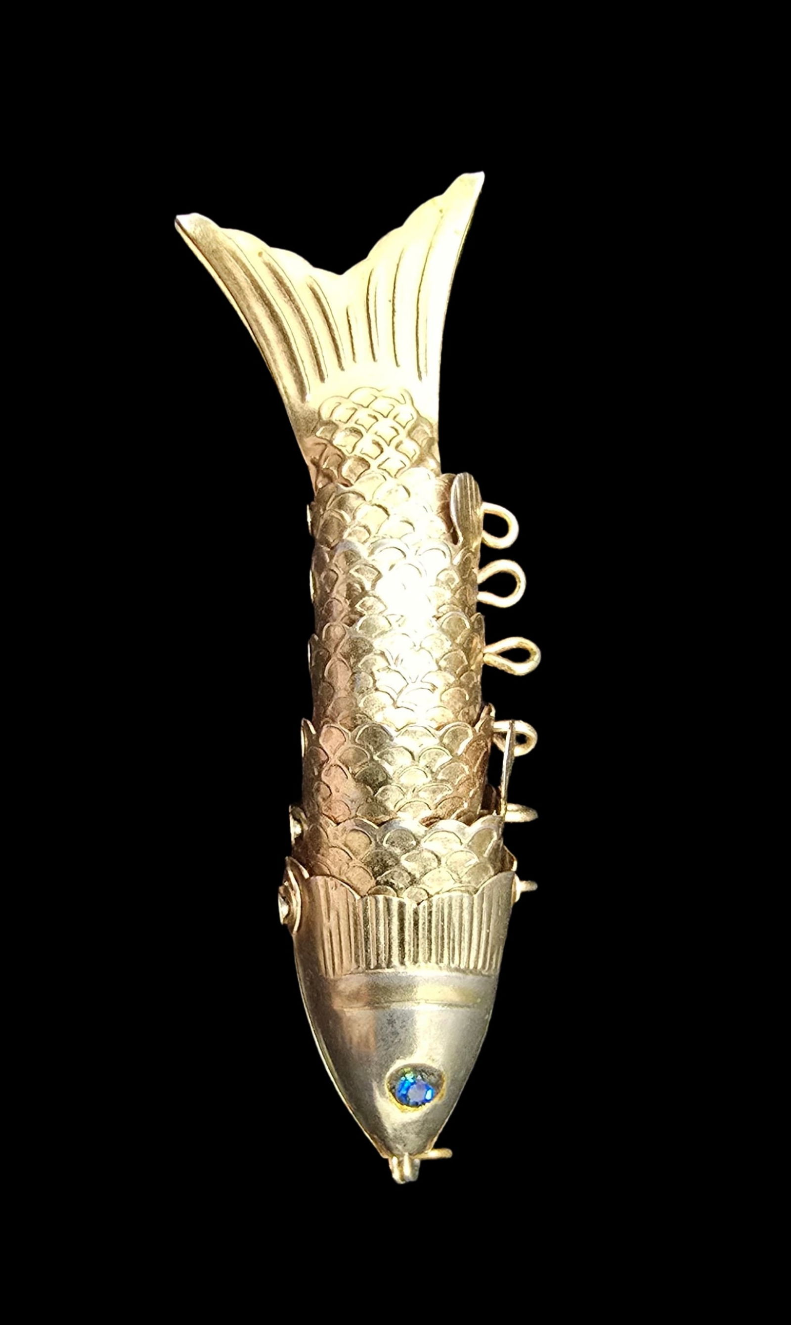 Unusual Vintage Gold-Tone Metal & Blue Gemstone Fish Pendant: Very good vintage condition with minor patina according to age. Measures approx. 2 1/2" long and weighs ca. 4 grams.