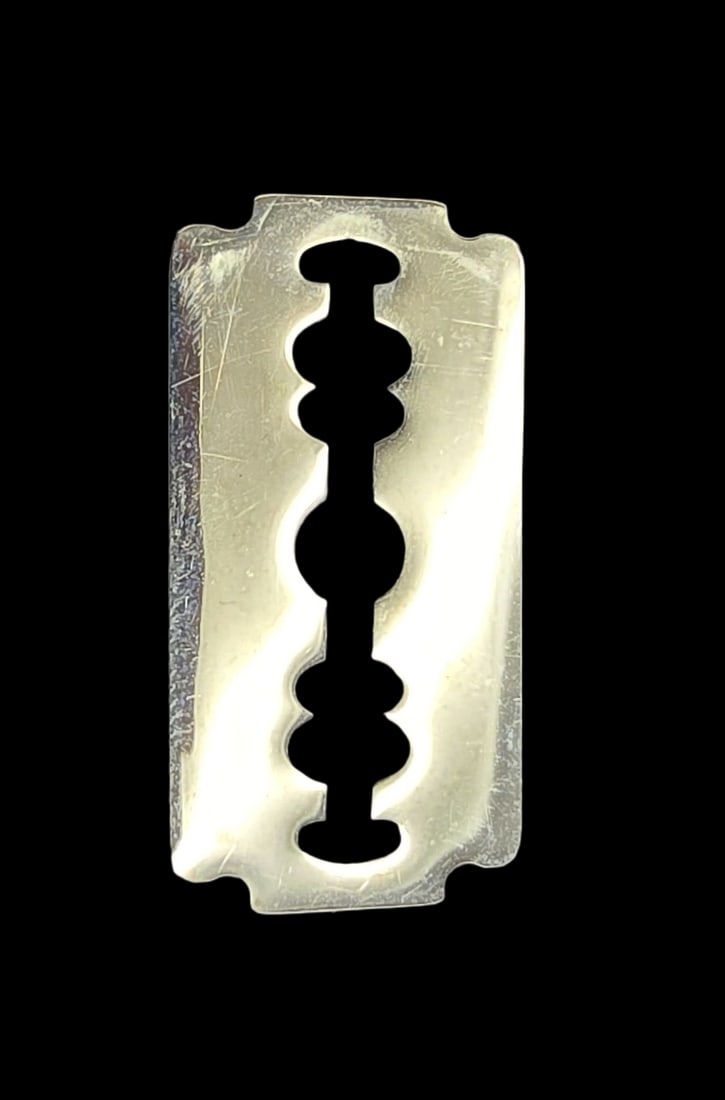 Very Unusual Vintage DIOR Razor Blade Pendant Charm: Very good vintage condition with minor patina according to age. Measures approx. 1" long x 1/2" wide and weighs ca. 5 grams. Marked DIOR.
