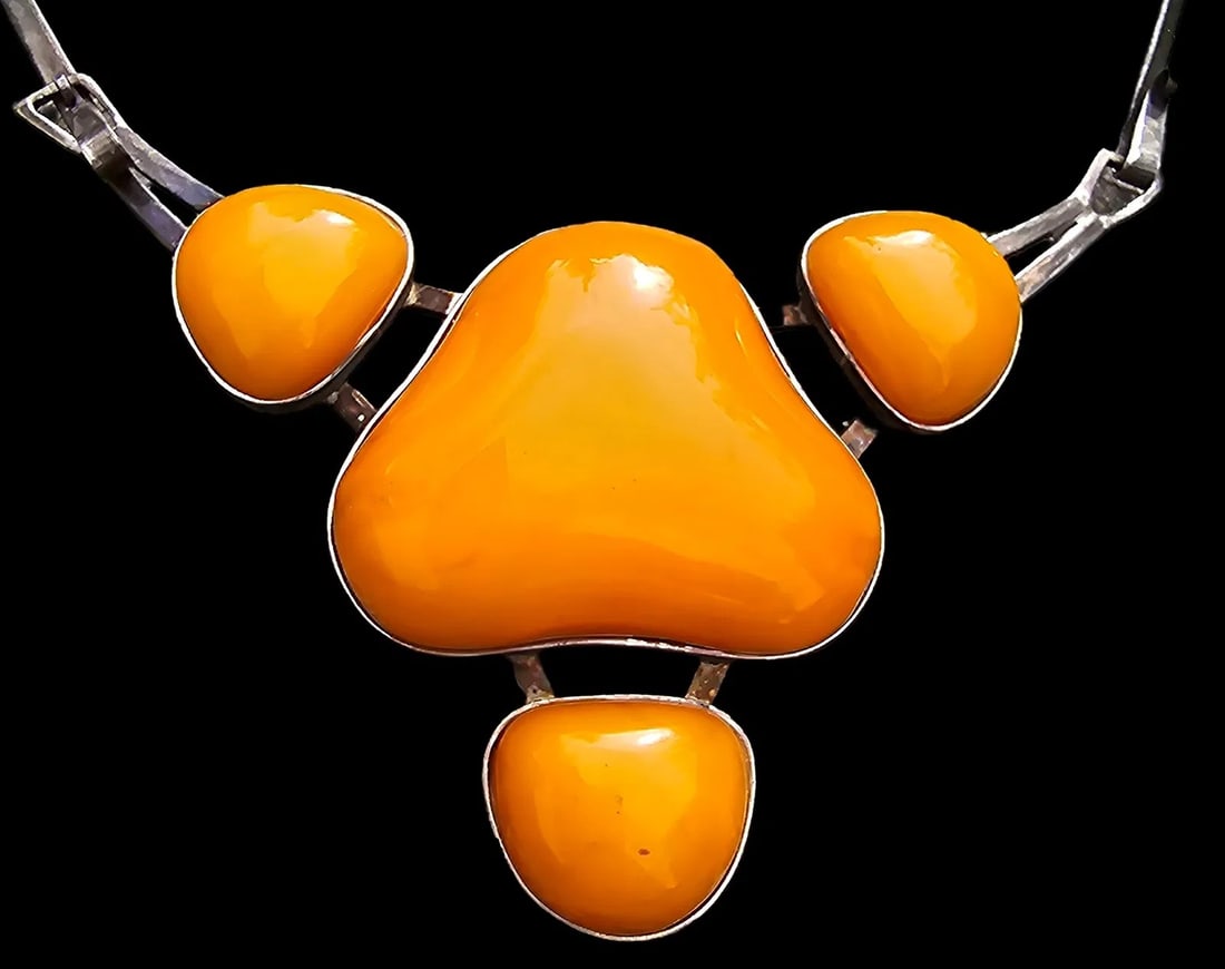 Rare & Large Vintage Eastern European or Russian Sterling Silver & Baltic Butterscotch Amber: Beautiful piece made from hand cut Baltic amber on a hand made Sterling Silver necklace. Very good antique condition with minor patina according to age. Measures approx 5 1/8"" long x 4" wide. Fully h