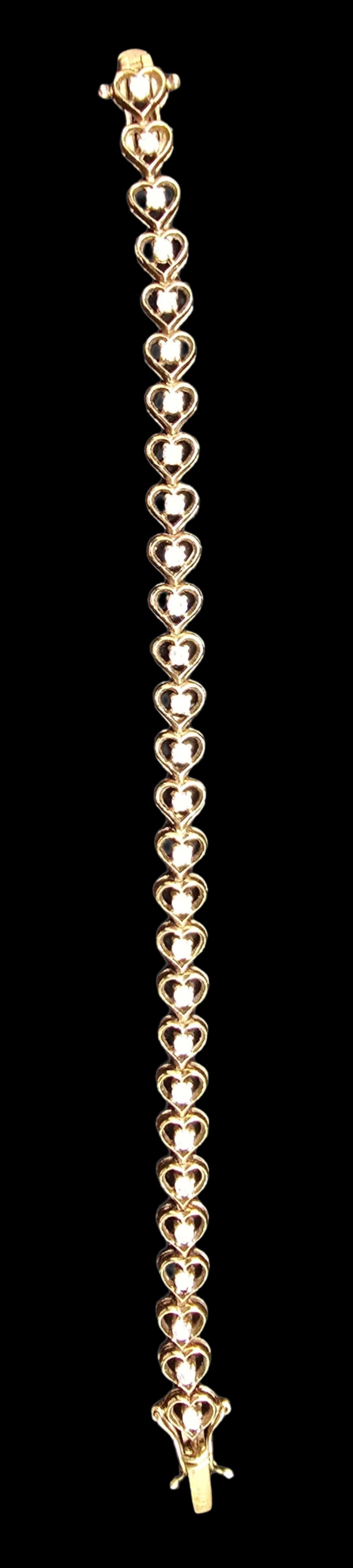 Beautiful Antique Gold Filled & Clear Gemstone Heart Shaped Panel Bracelet: Very good antique condition with minor patina according to age. Measures approx. 8" long and weighs ca. 12 grams.