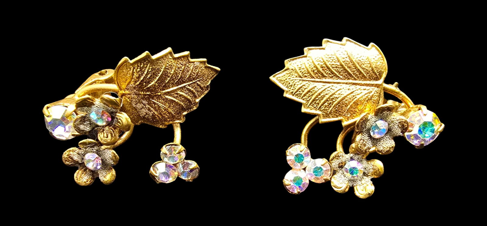 Beautiful Vintage Mid-Century Austrian Gold Filled & Rainbow Crystal Clip-On Earrings: Very good vintage condition with minor patina according to age. Each measures approx. 1" long and they jointly weigh ca. 6 grams. Marked.