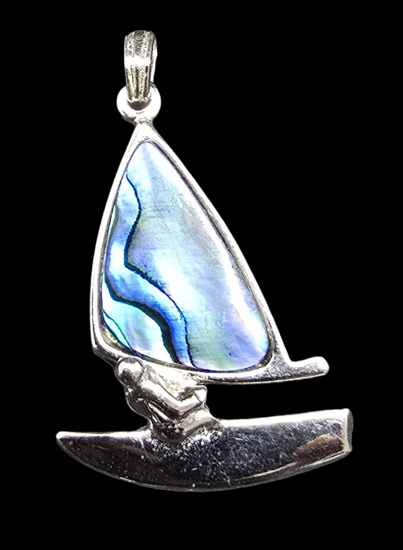 Beautiful Vintage Silver-Tone Metal & Mother of Pearl Costume Jewelry Designer Pendant Charm: Very good vintage condition with minor patina according to age. Measures approx. 1" long x 1/2" wide and weighs ca. 2 grams. Marked.