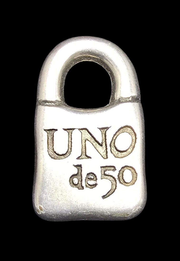 Amazing Vintage UNO DE 50 Padlock Designer Pendant Charm: Very good vintage condition with minor patina according to age. Measures approx. 1" long x 1/2" wide and weighs ca. 5.5 grams. Marked.