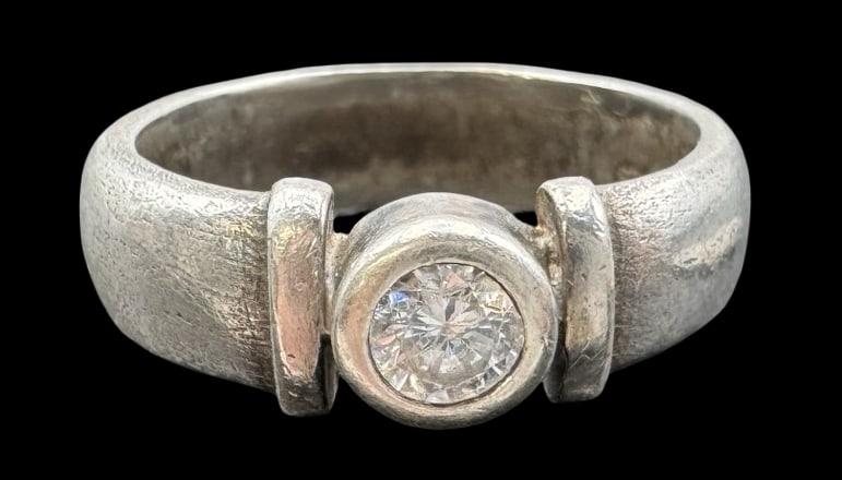 Vintage Sterling Silver & Clear Gemstone Solitaire Ring: Very good vintage condition with minor patina according to age. Weighs ca. 7.3 grams. The ring is a size 10. Marked for Sterling Silver.