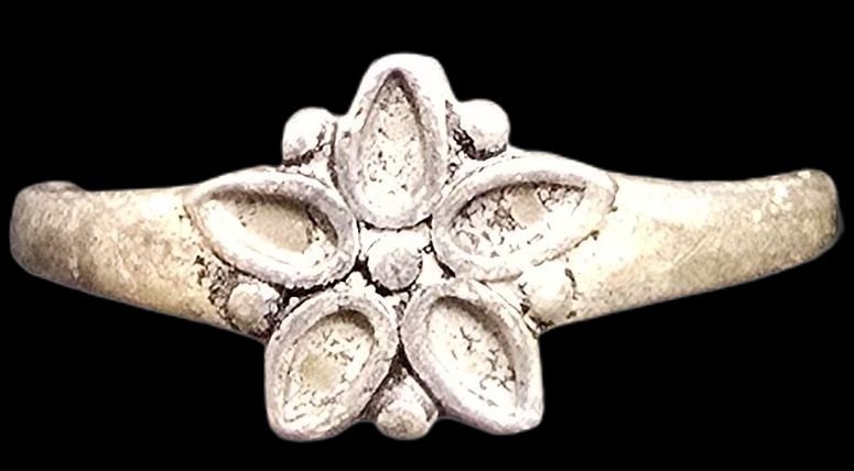 Mid-Century Southwestern Sterling Silver Ring: Very good vintage condition with minor patina according to age. The ring is a size 6.5 and weighs ca. 1 gram. Marked for Sterling Silver & Designer.