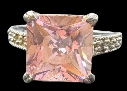 Beautiful Vintage Sterling Silver & Pink Cubic Zirconia Cocktail Ring: Very good vintage condition with minor patina according to age. Measures approx. 3/8" long and 3/3" wide and weighs ca. 8.3 grams. The ring is a size 3.9. Marked for Sterling Silver
