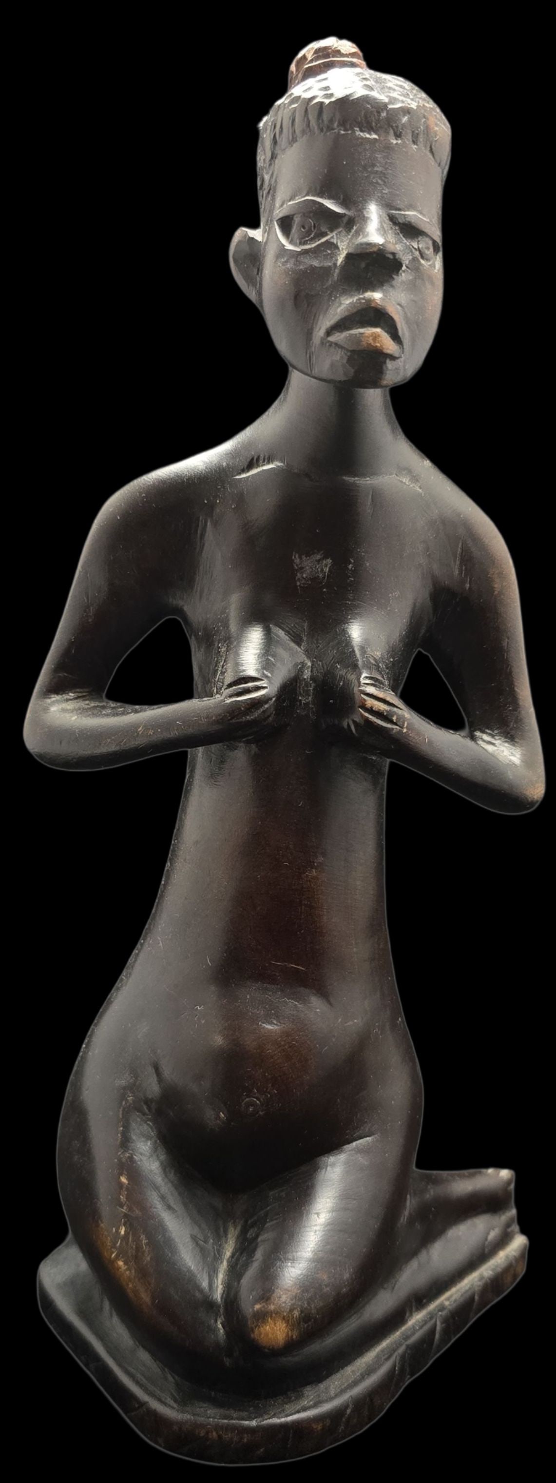 Stunning Vintage Hand Carved African Hardwood Nude Female Figurine: Very good vintage condition with minor wear according to age. No chips, cracks or repairs. Measures approx. 11 1/2" high x 5" wide.