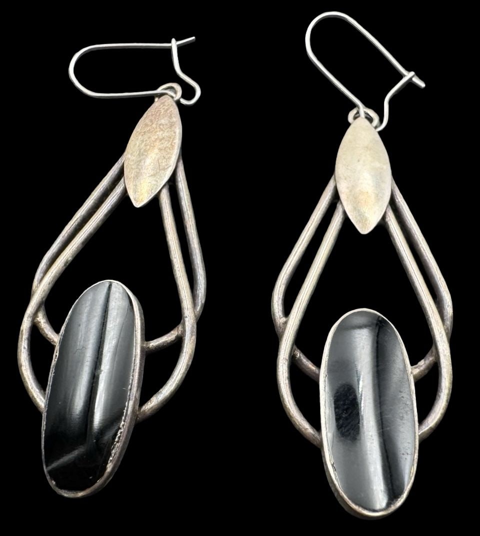 Vintage Mid-Century Sterling Silver & Black Onyx Dangle Earrings: Very good vintage condition with minor patina according to age. Each measures approx. 1 1/2" high x 3/4" wide and they jointly weigh ca. 8.9 grams. Marked for Sterling Silver.