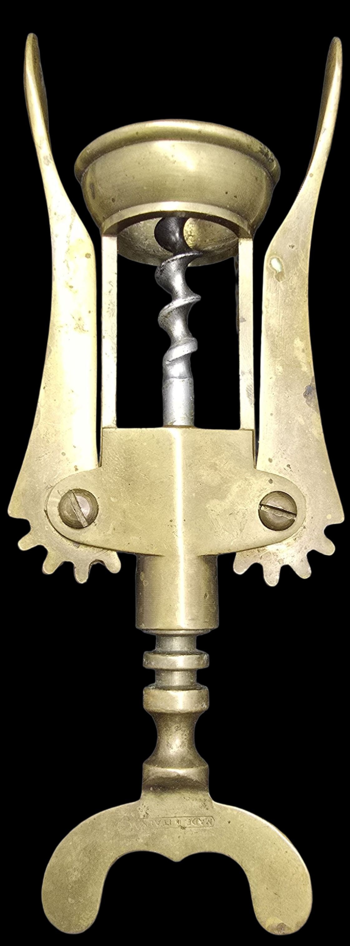 Gorgeous Vintage Italian Brass Wine Bottle Opener: Very good antique condition with minor patina according to age. Measures approx. 7" long x 2 1/2" wide and weighs ca. 200 grams. Marked.