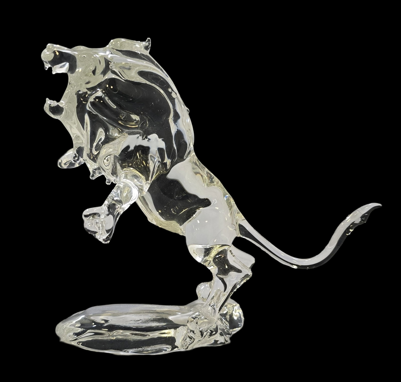 Vintage Crystal Lion Figurine: Very good vintage condition; no damage. Measures approx. 6 1/2" high x 5" long.