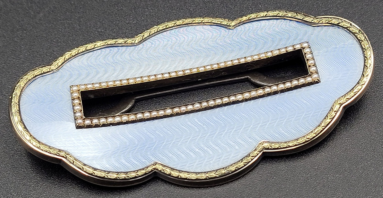 Antique Imperial Russian Henrik Wigström for FABERGE Silver & Blue Guilloche Enamel Belt Buckle: Stunning piece of lobed oval form with light blue guilloche enamel, gilt borders set with seed pearls, with silver clip, hallmarked, 88 Zolotniki (916.64 Silver) standard. Excellent antique condition.