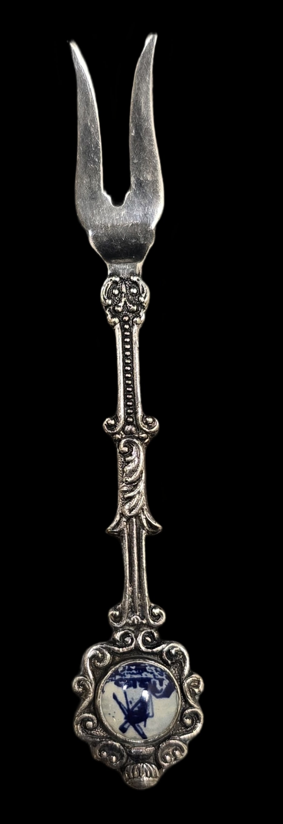 Vintage Dutch Silverplate Cocktail Fork /w Delft Porcelain Inlay: Very good vintage condition with some patina and wear according to age. Measures approx. 3 1/2" long, Marked.