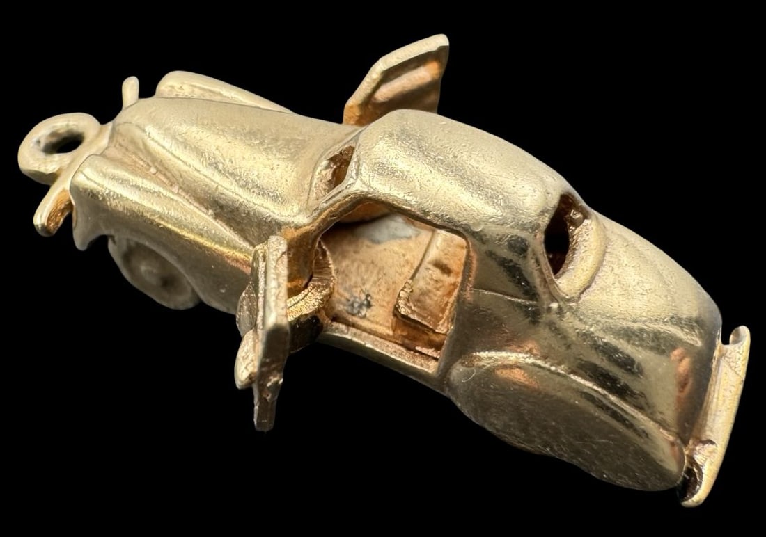 Whimsical Vintage 1930s 14K Gold Car Charm /w Rotating Wheels and Opening Doors: Very good vintage condition with minor patina according to age. Measures approx. 1" long x 1/4" wide and weighs ca. 4.8 grams. Tested for a minimum of 14K gold.