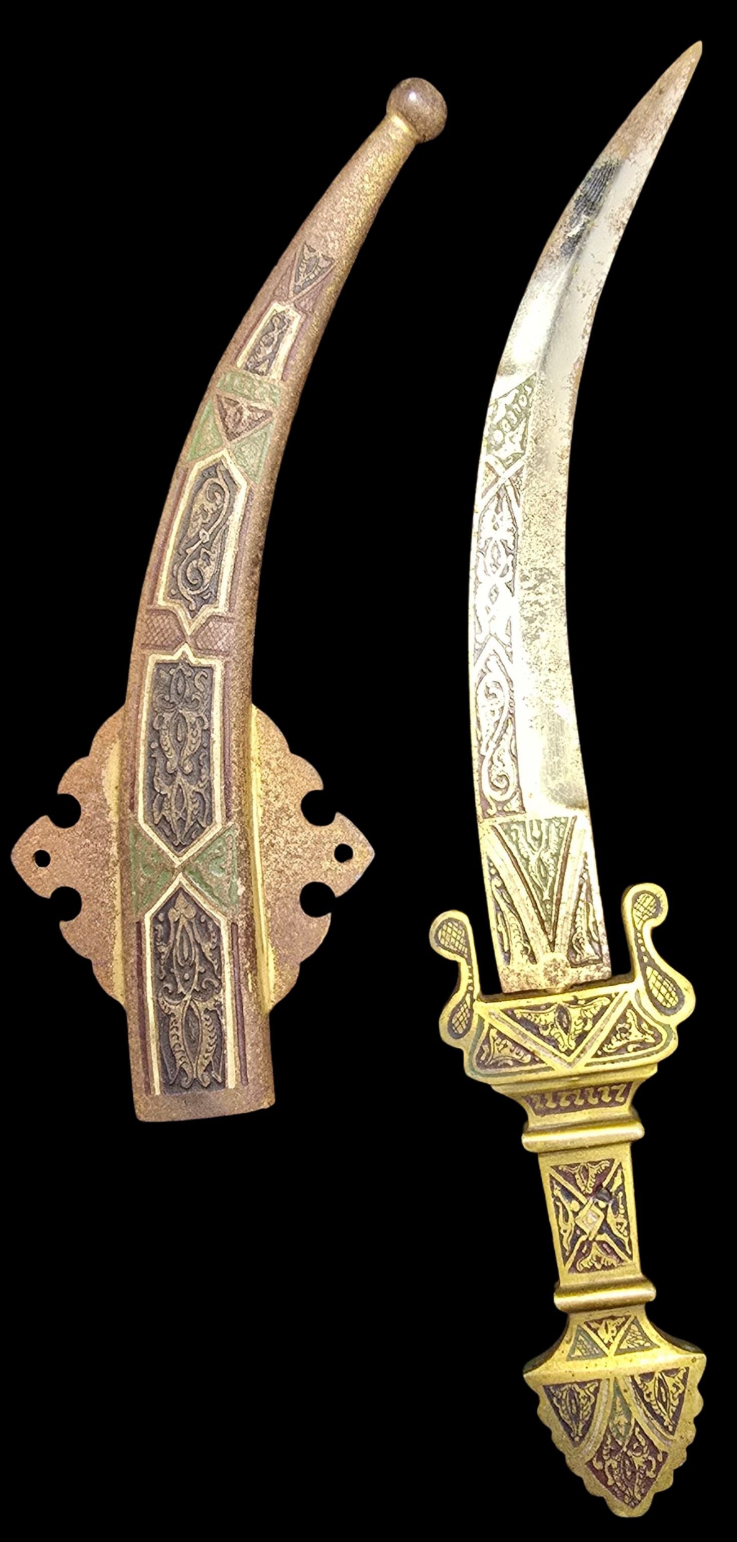 Very Ornate Vintage Oriental Brass Dagger /w Sheath: Very good antique condition with minor corrosion and patina according to age. Measures approx. 9" long x 1" wide.