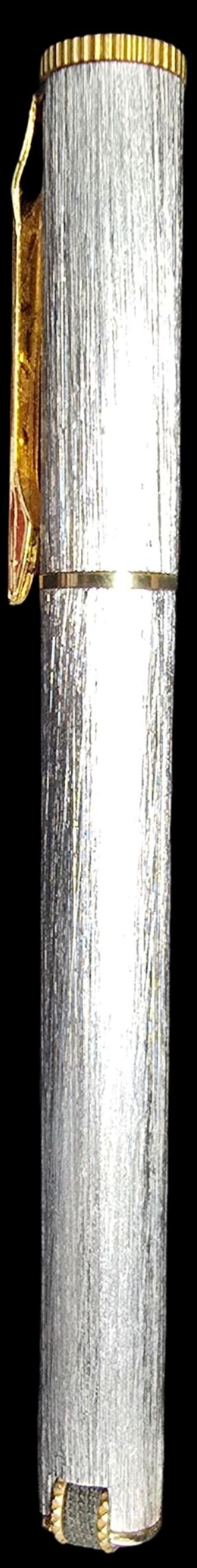 Very Cool Vintage COLIBRI Two Tone Gold & Silver Pen Lighter: Very good vintage condition with minor patina according to age. Measures approx. 4" long and weighs ca. 30 grams. Marked.